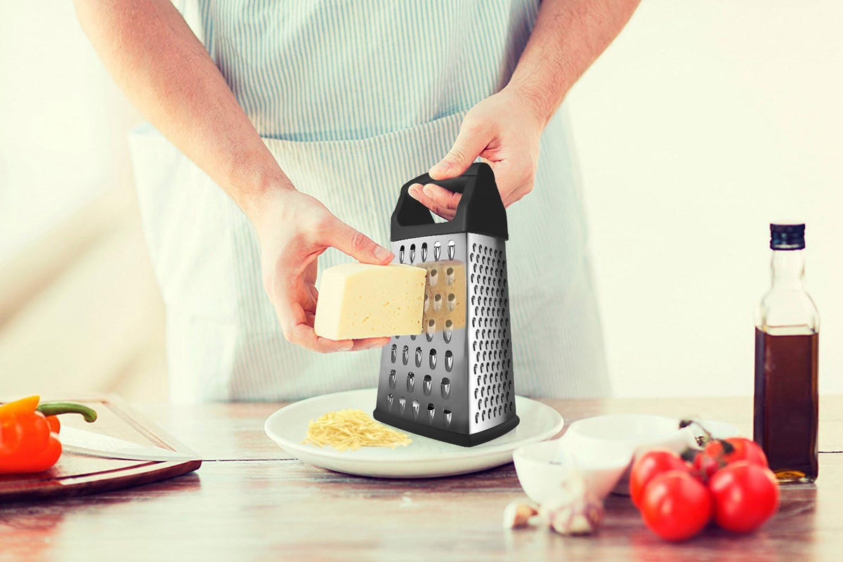 Bene Casa hand-held, 4-way grater, stainless-steel blade grater, comfort handle grater, easy to use, 4-cut grater for cheese, fruit and more. BC-26023